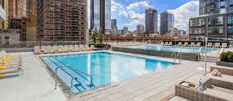 enjoy your rooftop deck and swimming pool at your condos for rent no credit check